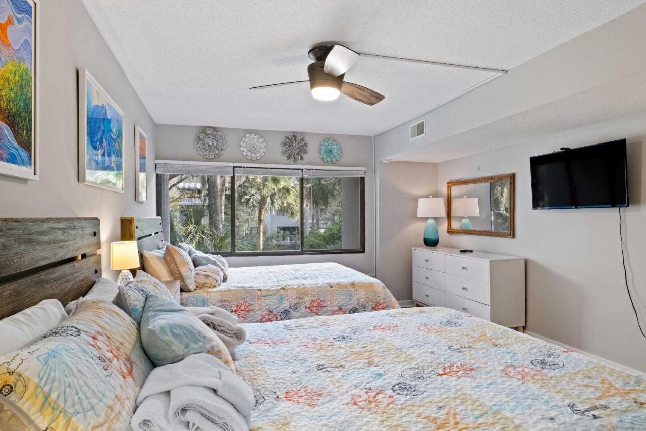 Apartment Coastal Oasis With Pool - Walk To Coligny Park *
